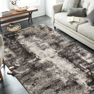 Brilatní béžově hnědý koberec s jemným abstraktním motivem Šířka: 60 cm | Délka: 100 cm