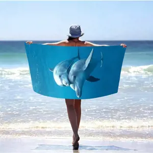 Produkt Modrá plážová osuška s delfíny