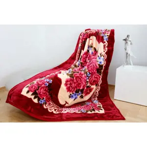 Produkt Teplá deka s květinami červené barvy